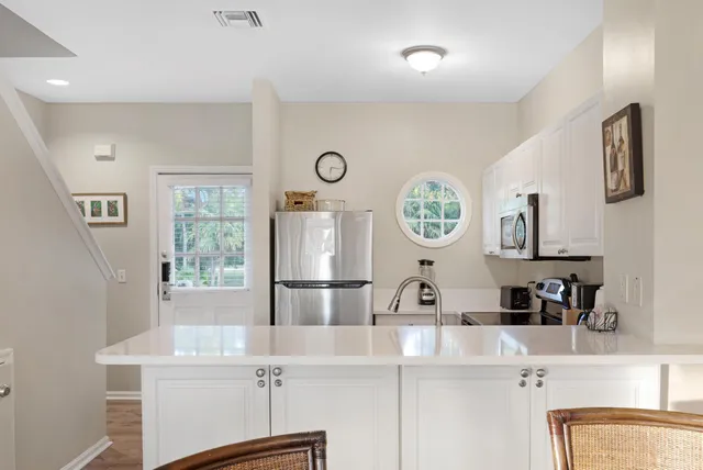 a bathroom with a sink and a large mirror