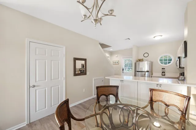 a view of a dining room with furniture