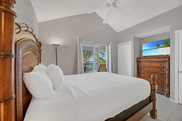 a bedroom with a bed and a fireplace