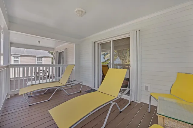 a view of a house with a small yard