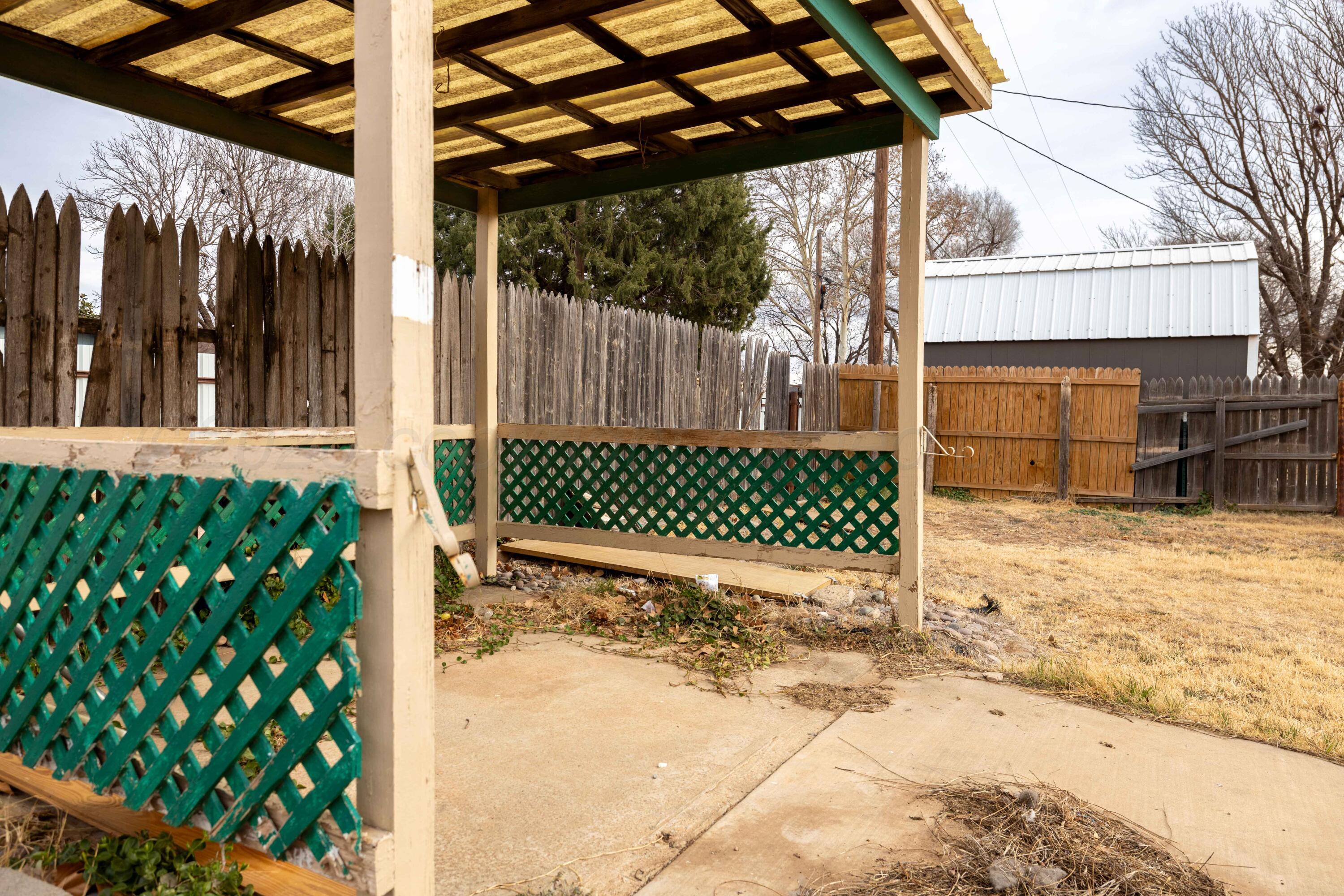 712 West Oak Street Dimmitt, TX 79027 - Photo 17 of 19 a view of a backyard