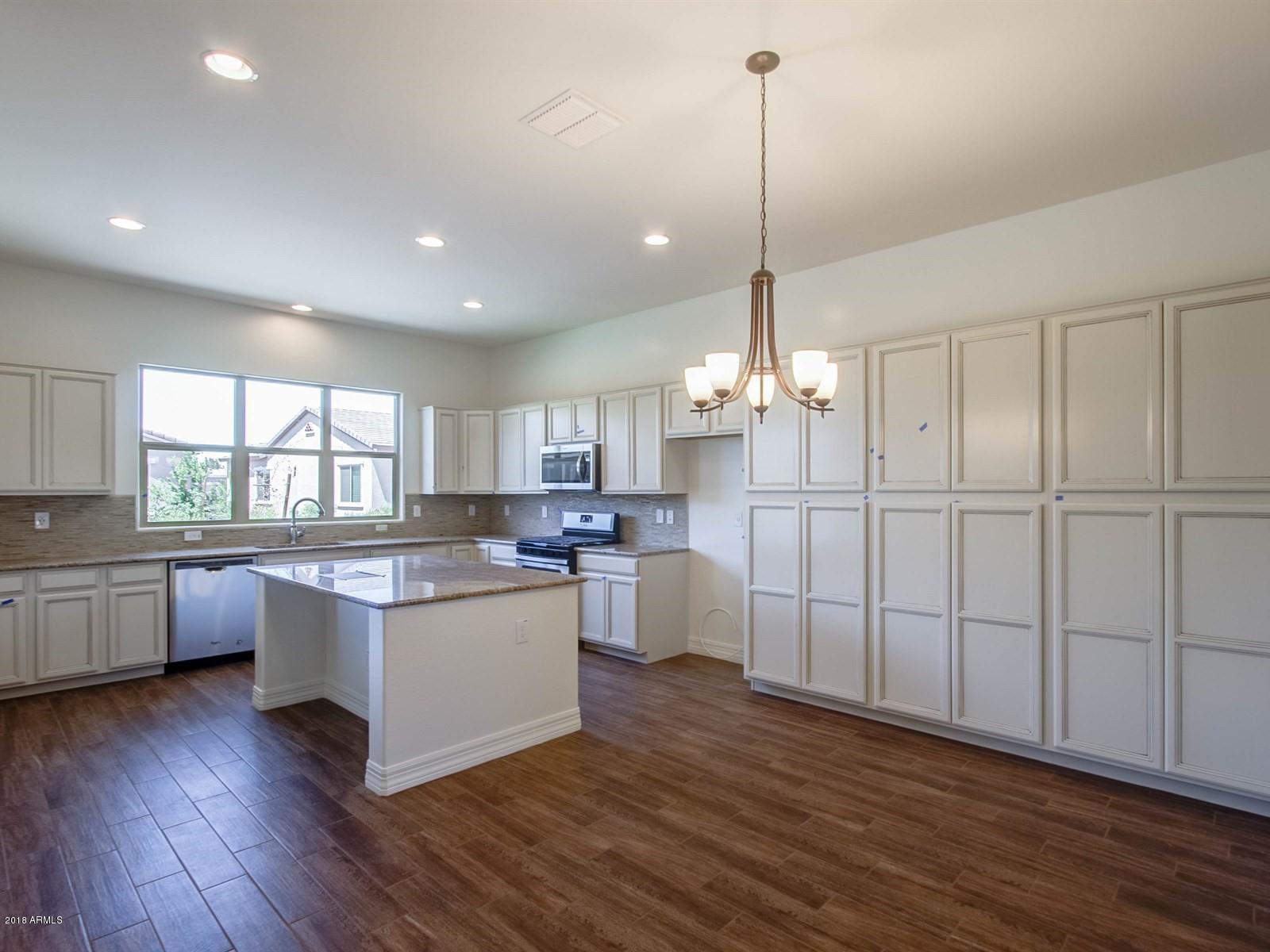 42940 West Mallard Road Maricopa, AZ 85138 - Photo 6 of 14 006_KitchenDining Room