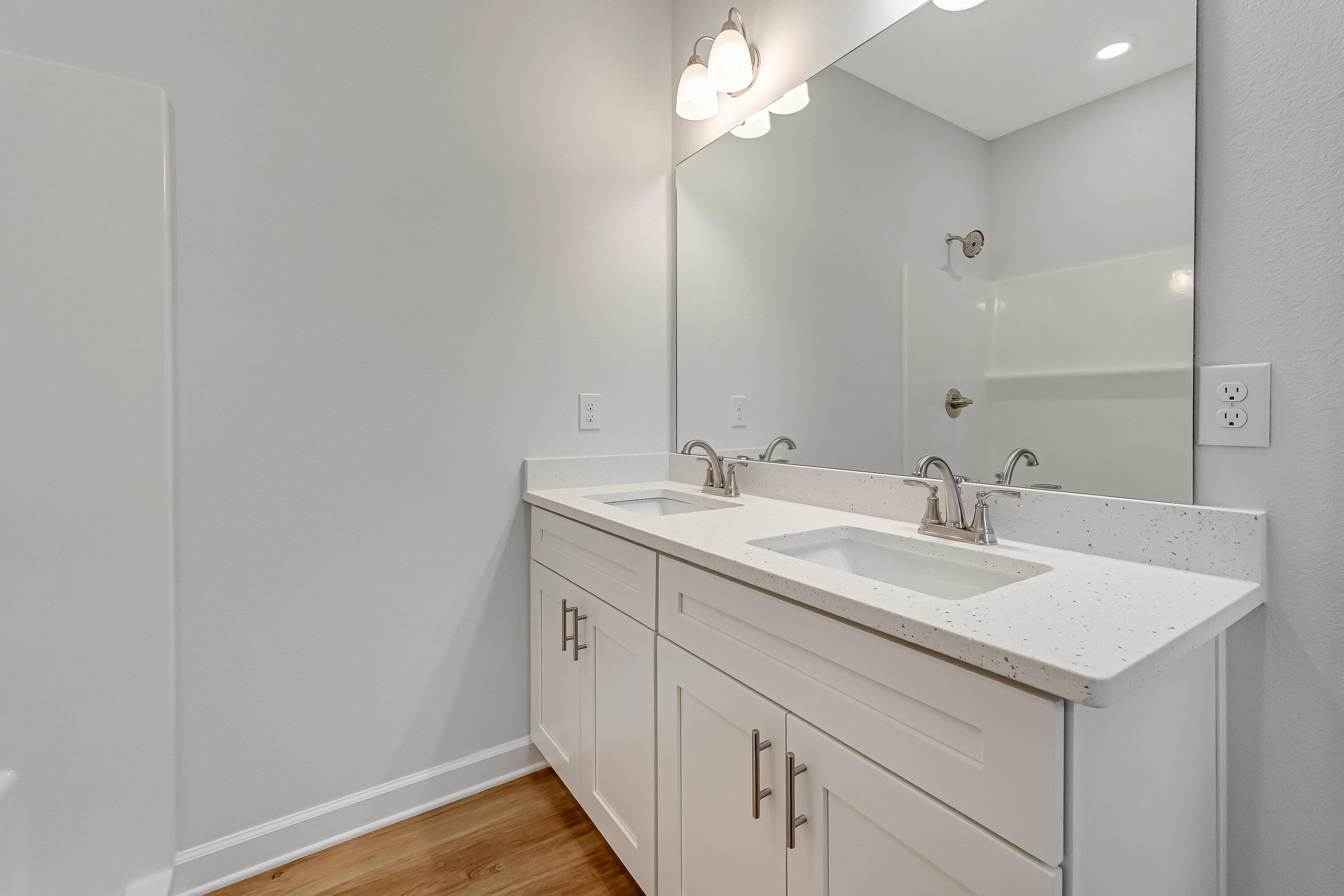 47 Shebbi Lane Freeport, FL 32439 - Photo 11 of 24 a bathroom with a sink and a mirror