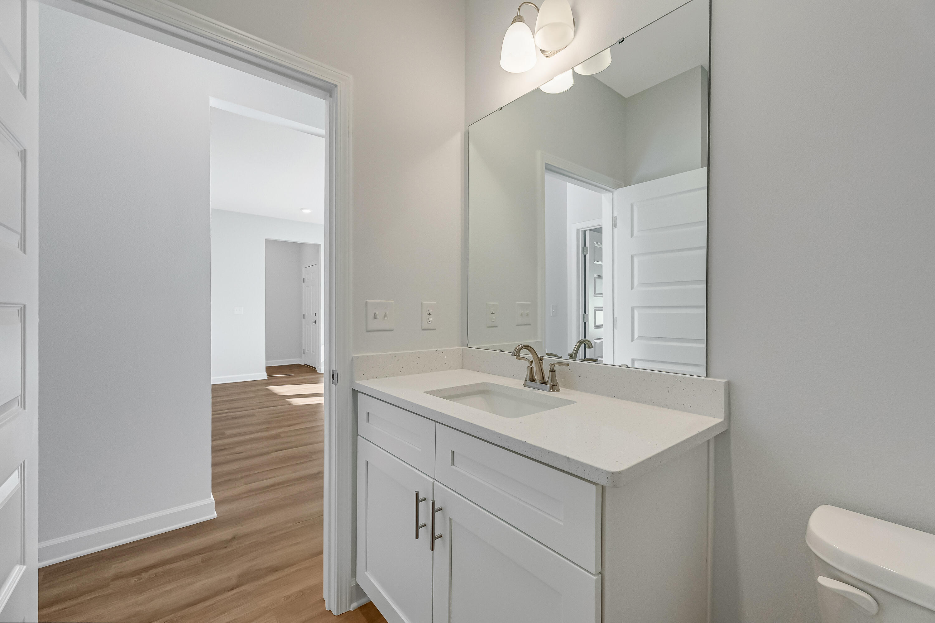 47 Shebbi Lane Freeport, FL 32439 - Photo 15 of 24 a bathroom with a sink and a mirror