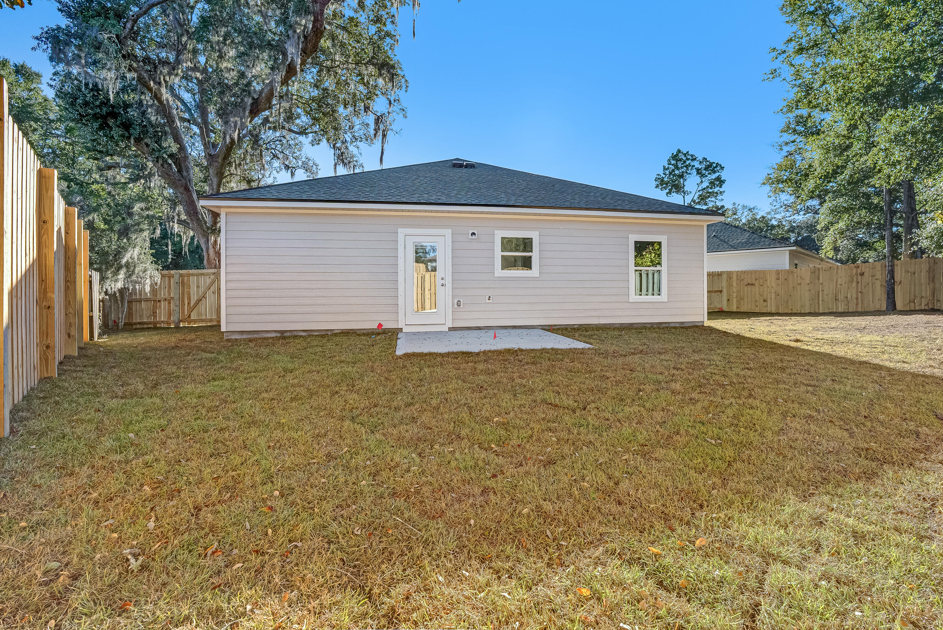 47 Shebbi Lane Freeport, FL 32439 - Photo 24 of 24 a front view of house with yard and trees