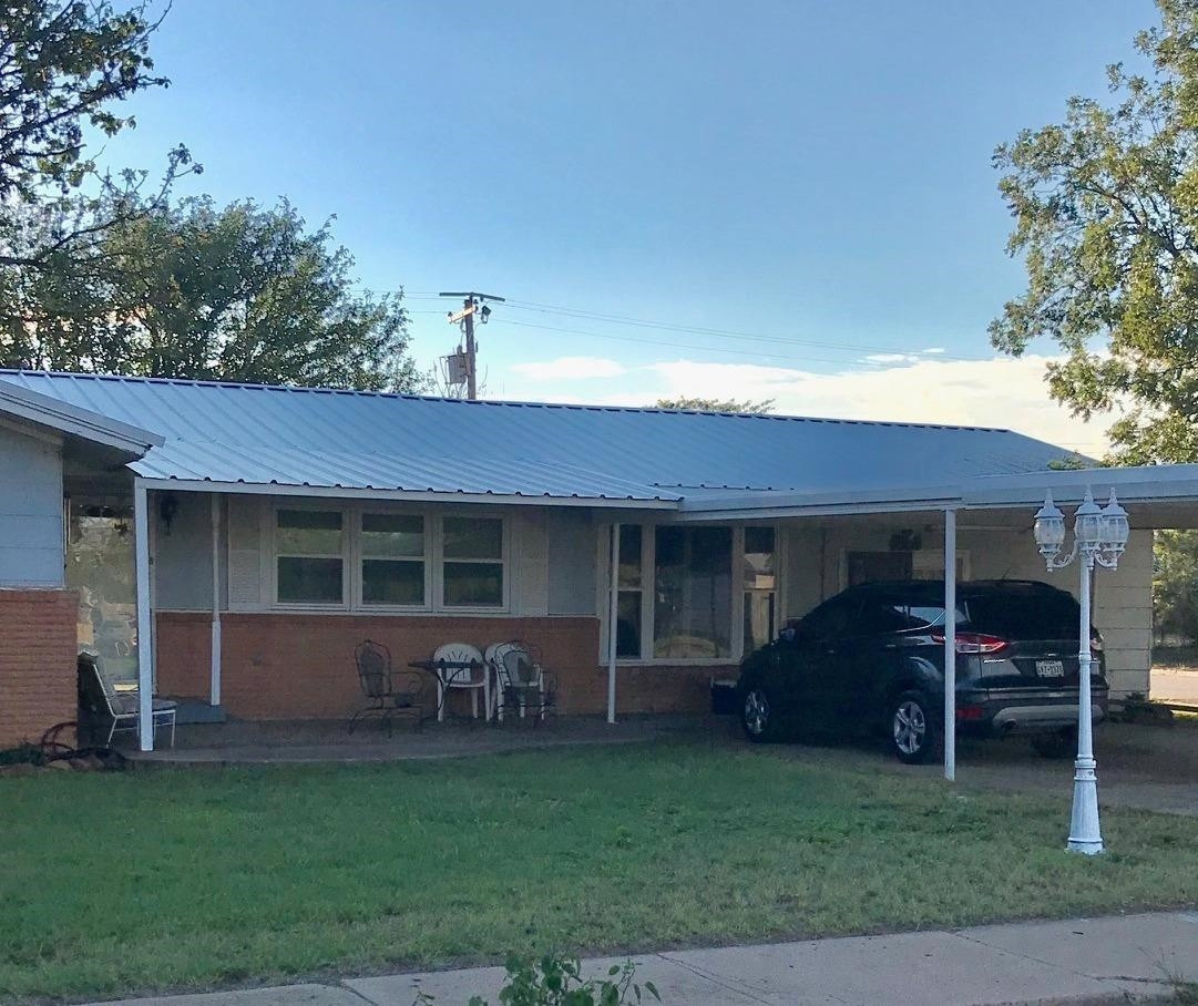 1107 Ave M Ralls, TX 79357 - Photo 1 of 11 a view of a house with a yard