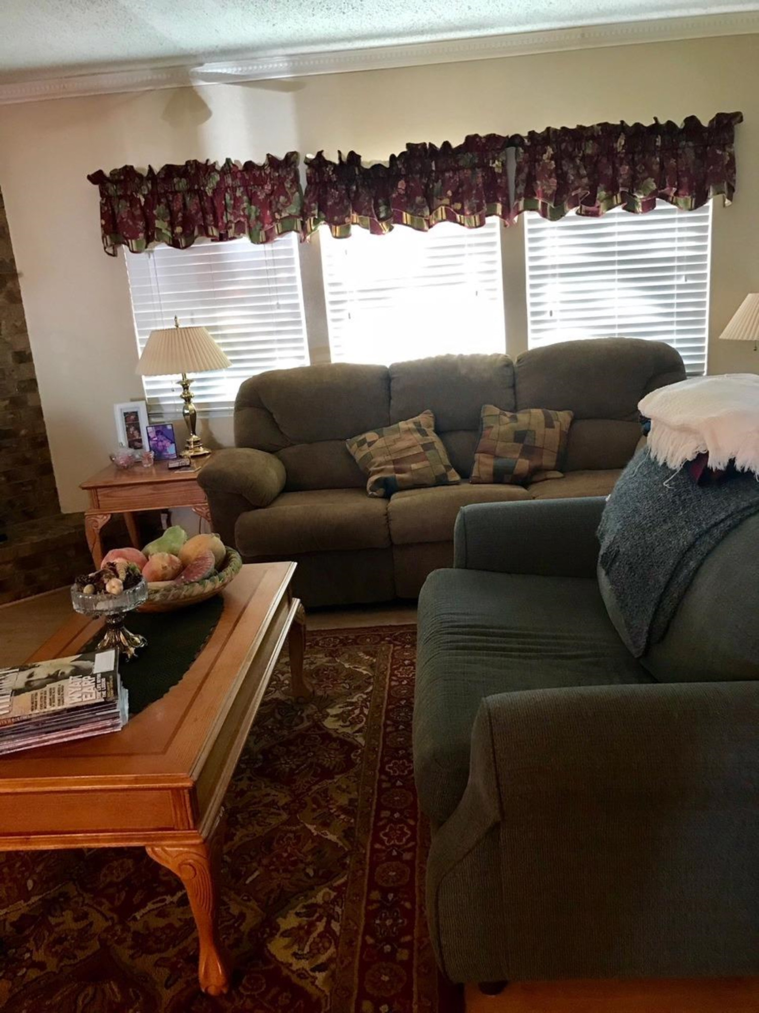 1107 Ave M Ralls, TX 79357 - Photo 3 of 11 a living room with furniture and a large window