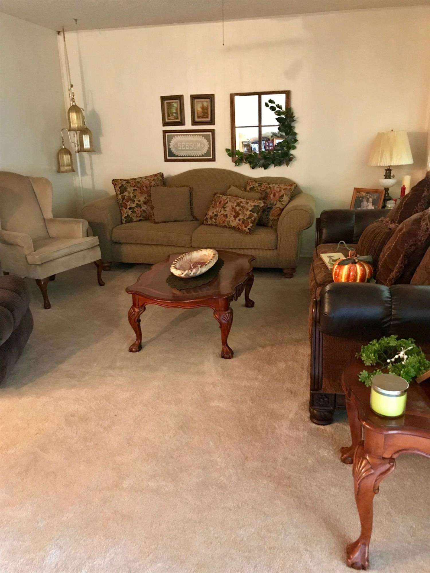 1107 Ave M Ralls, TX 79357 - Photo 4 of 11 a living room with furniture and a potted plant