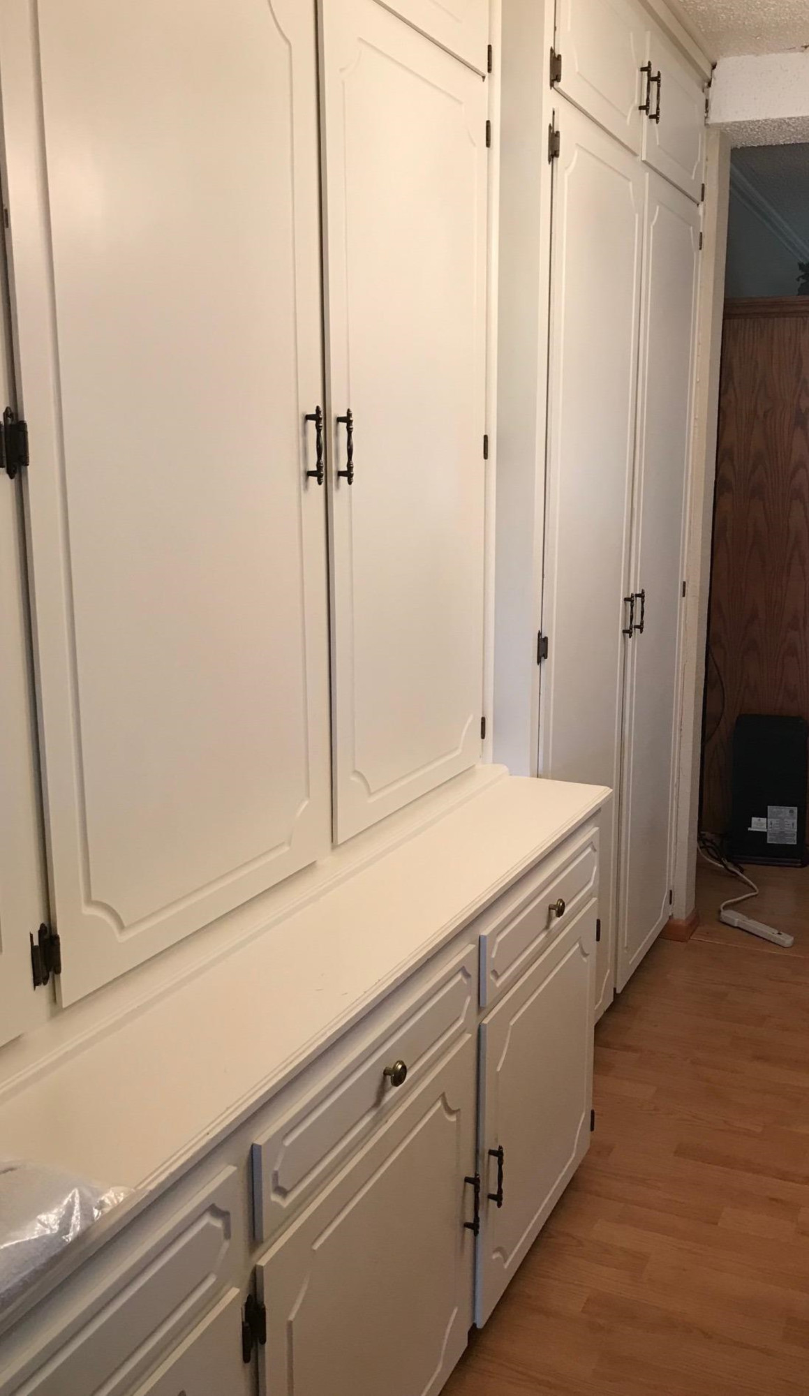 1107 Ave M Ralls, TX 79357 - Photo 6 of 11 a view of a kitchen with white cabinets