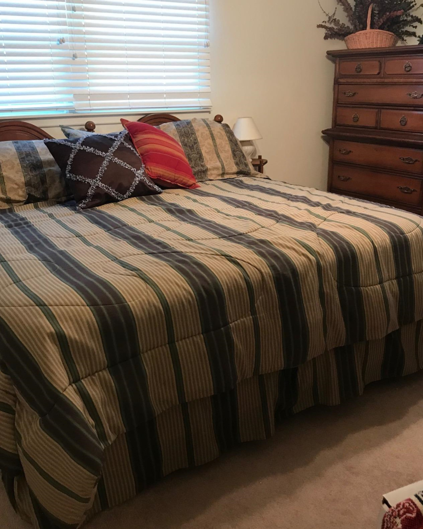 1107 Ave M Ralls, TX 79357 - Photo 8 of 11 a bed sitting in a bedroom next to a window