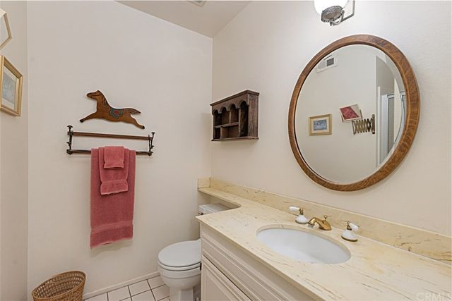 a bedroom with a large bed and a large window