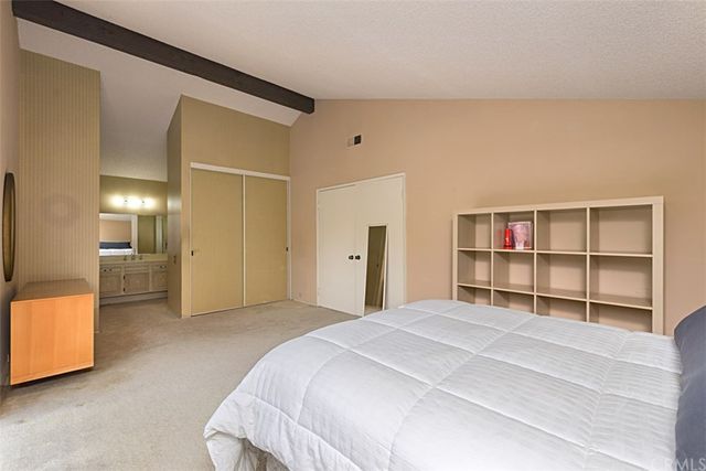 a view of a livingroom with furniture and a window