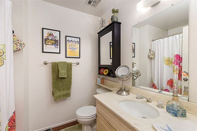 a view of a house with backyard porch and furniture