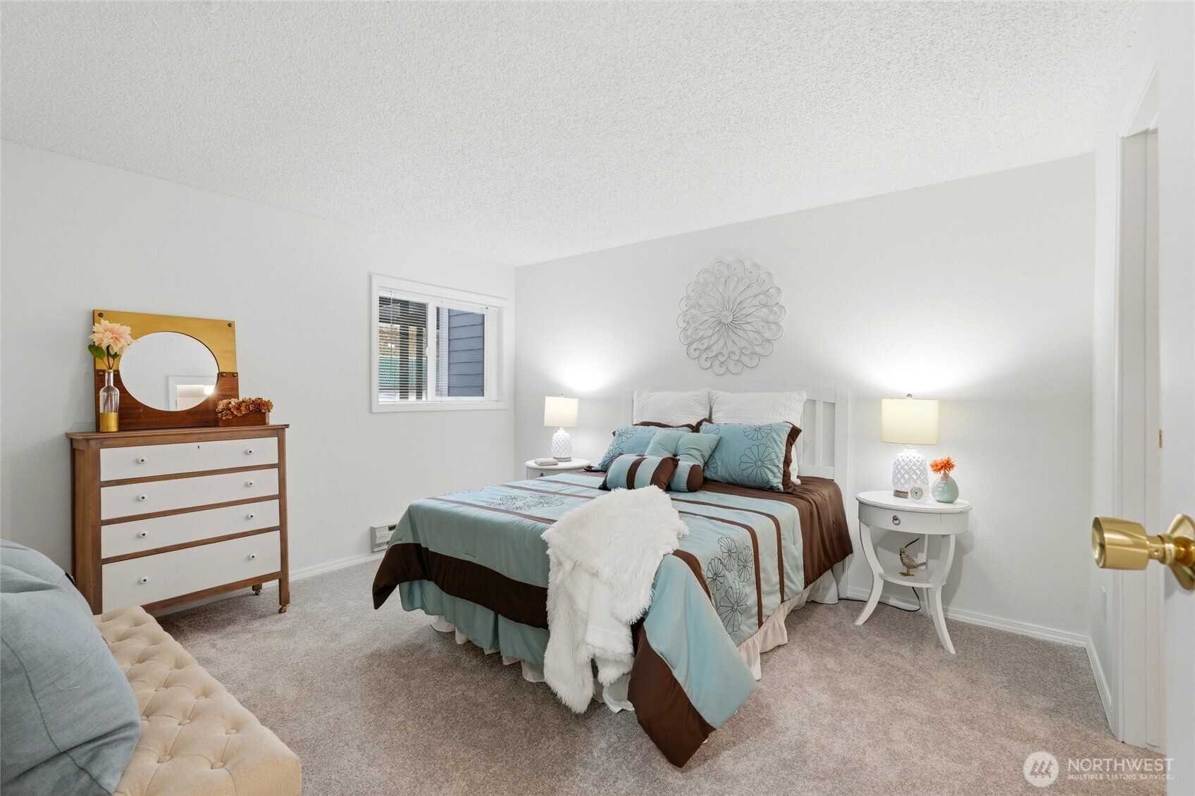2531 South 248th Street, Unit A18 Kent, WA 98032 - Photo 17 of 28 a bedroom with a bed and dresser