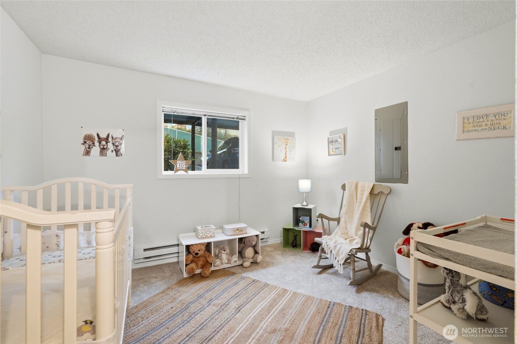 2531 South 248th Street, Unit A18 Kent, WA 98032 - Photo 19 of 28 a bedroom with furniture and a window