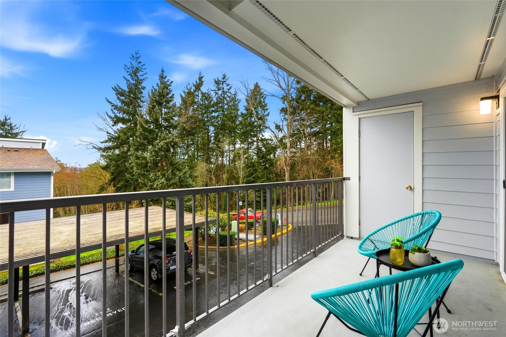 2531 South 248th Street, Unit A18 Kent, WA 98032 - Photo 21 of 28 a view of a balcony with furniture