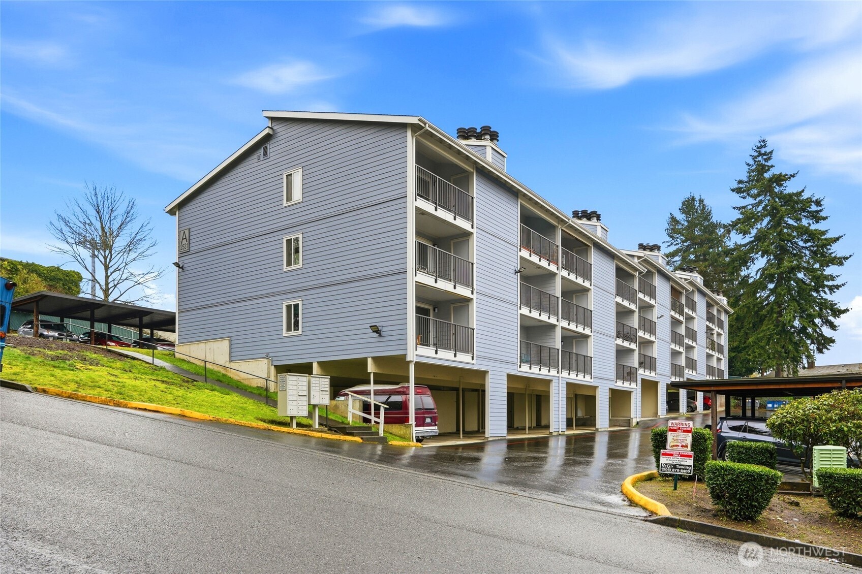 2531 South 248th Street, Unit A18 Kent, WA 98032 - Photo 23 of 28 a front view of a building with street view