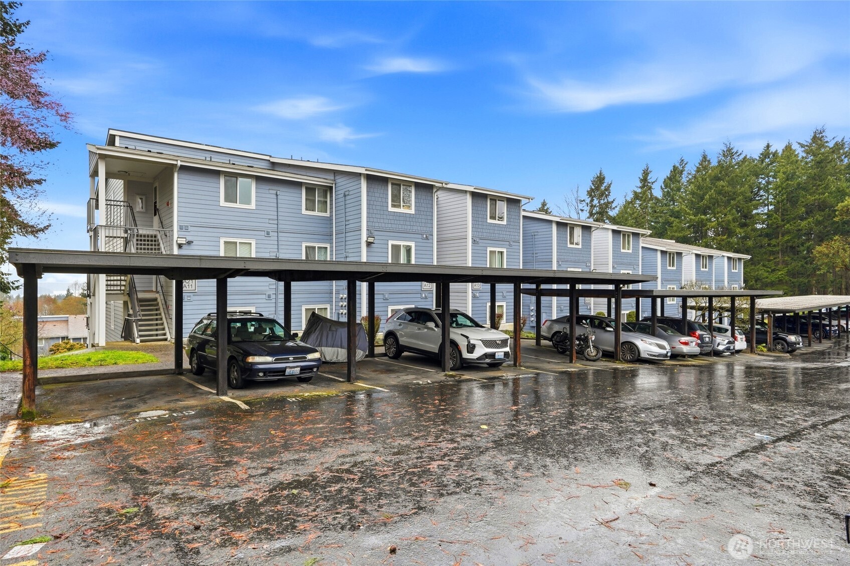 2531 South 248th Street, Unit A18 Kent, WA 98032 - Photo 24 of 28 a view of house with outdoor space and swimming pool
