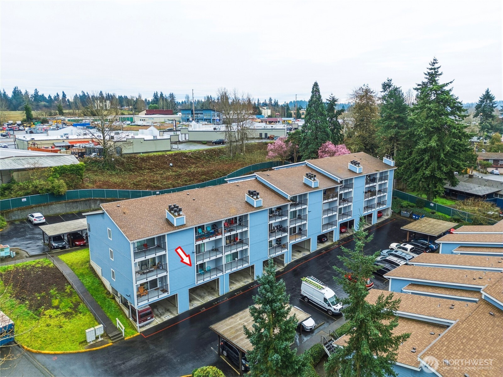 2531 South 248th Street, Unit A18 Kent, WA 98032 - Photo 27 of 28 an aerial view of multiple houses with a yard