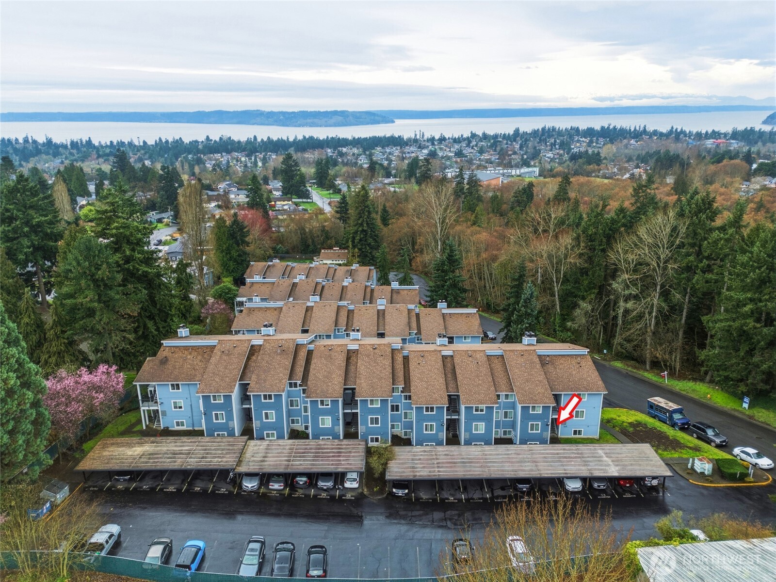 2531 South 248th Street, Unit A18 Kent, WA 98032 - Photo 28 of 28 a view of house with yard and lake view
