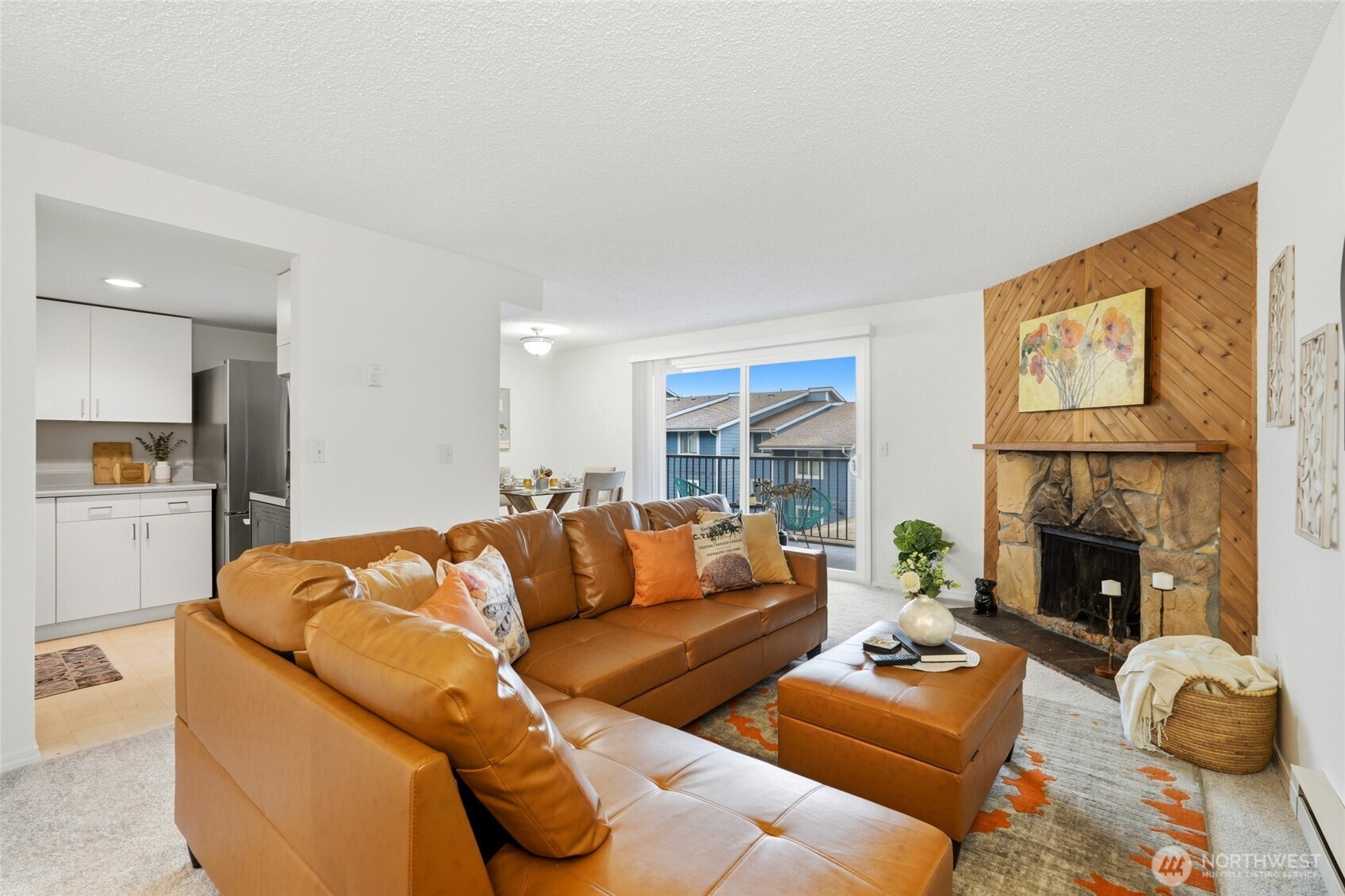 2531 South 248th Street, Unit A18 Kent, WA 98032 - Photo 5 of 28 a living room with furniture and a fireplace