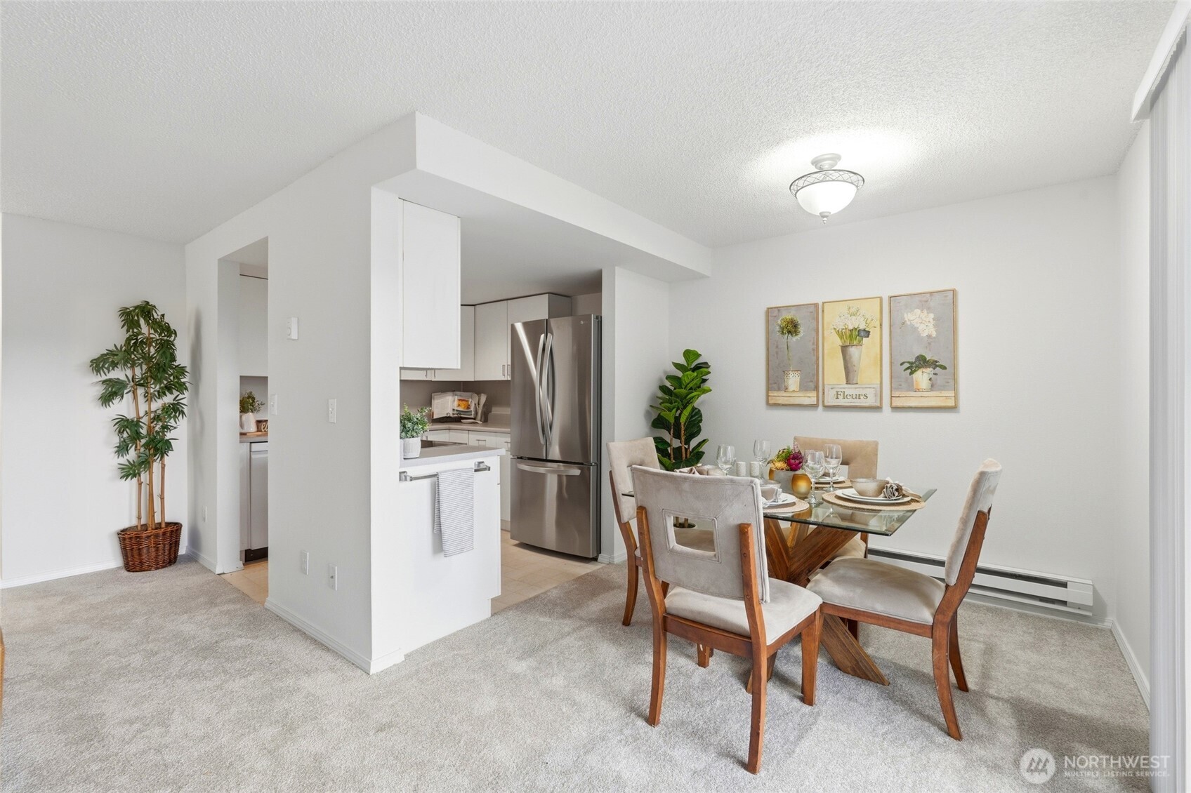 2531 South 248th Street, Unit A18 Kent, WA 98032 - Photo 10 of 28 a dining room with furniture and window