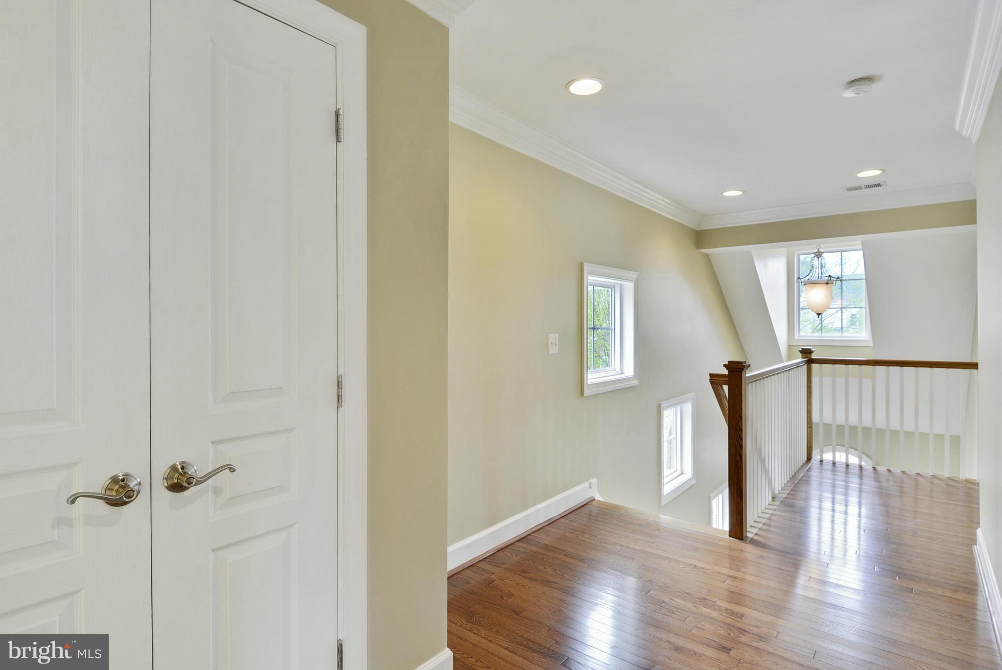 42445 Spring Splendor Drive Ashburn, VA 20148 - Photo 15 of 30 Upstairs Hallway