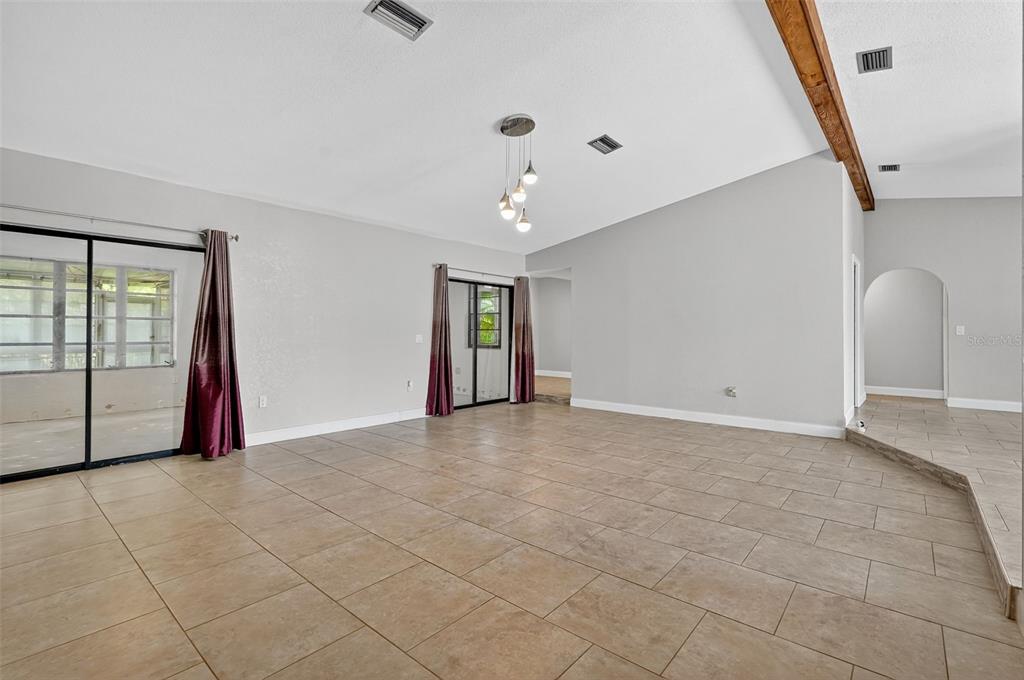 3025 Whitewood Avenue Spring Hill, FL 34609 - Photo 19 of 53 a view of an empty room with a window