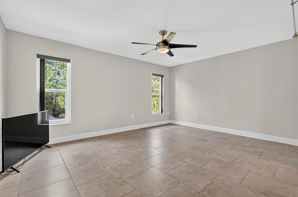 3025 Whitewood Avenue Spring Hill, FL 34609 - Photo 21 of 53 a view of an empty room with a window