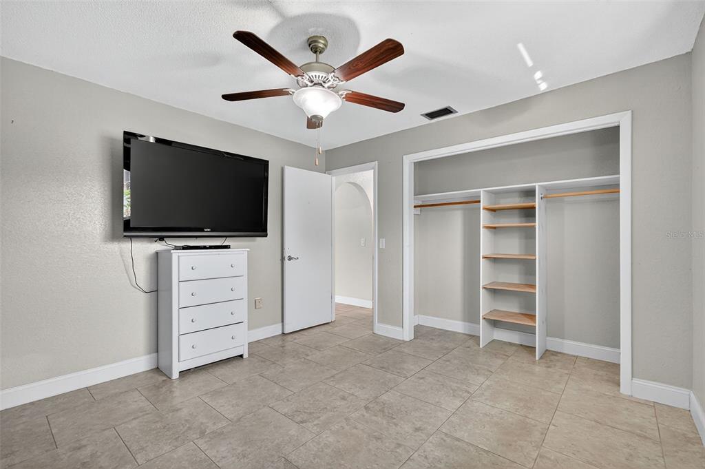 3025 Whitewood Avenue Spring Hill, FL 34609 - Photo 29 of 53 a view of an empty room with a flat screen tv