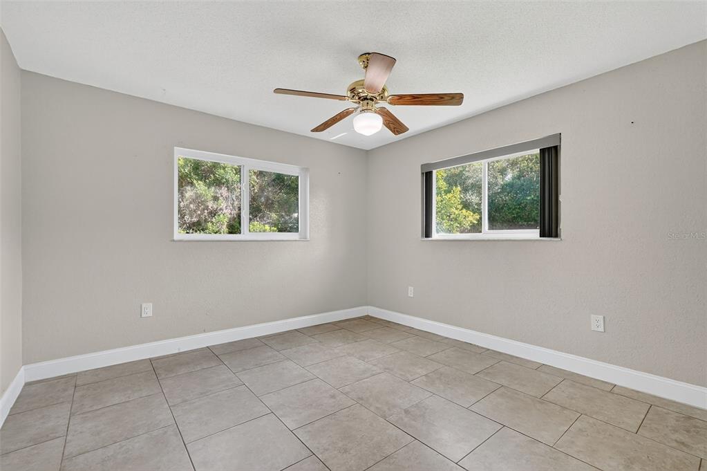 3025 Whitewood Avenue Spring Hill, FL 34609 - Photo 32 of 53 a view of an empty room with a window