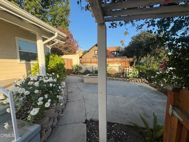 a house view with a outdoor space