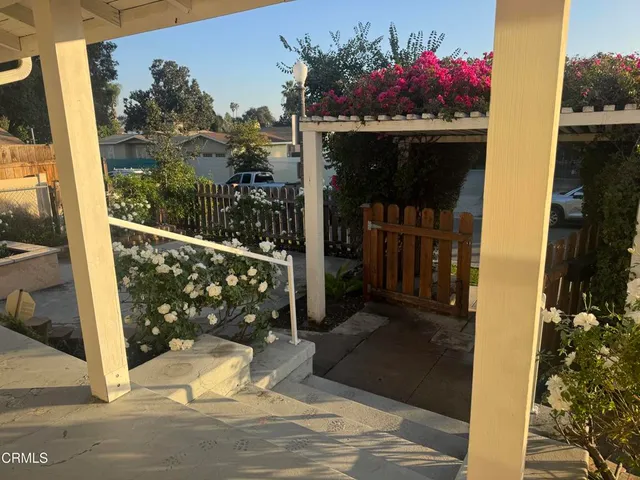 a front view of a house with a porch