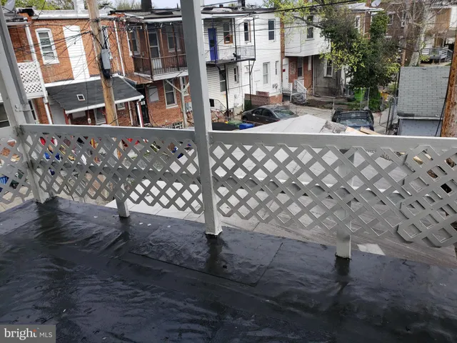a kitchen with a refrigerator and a stove
