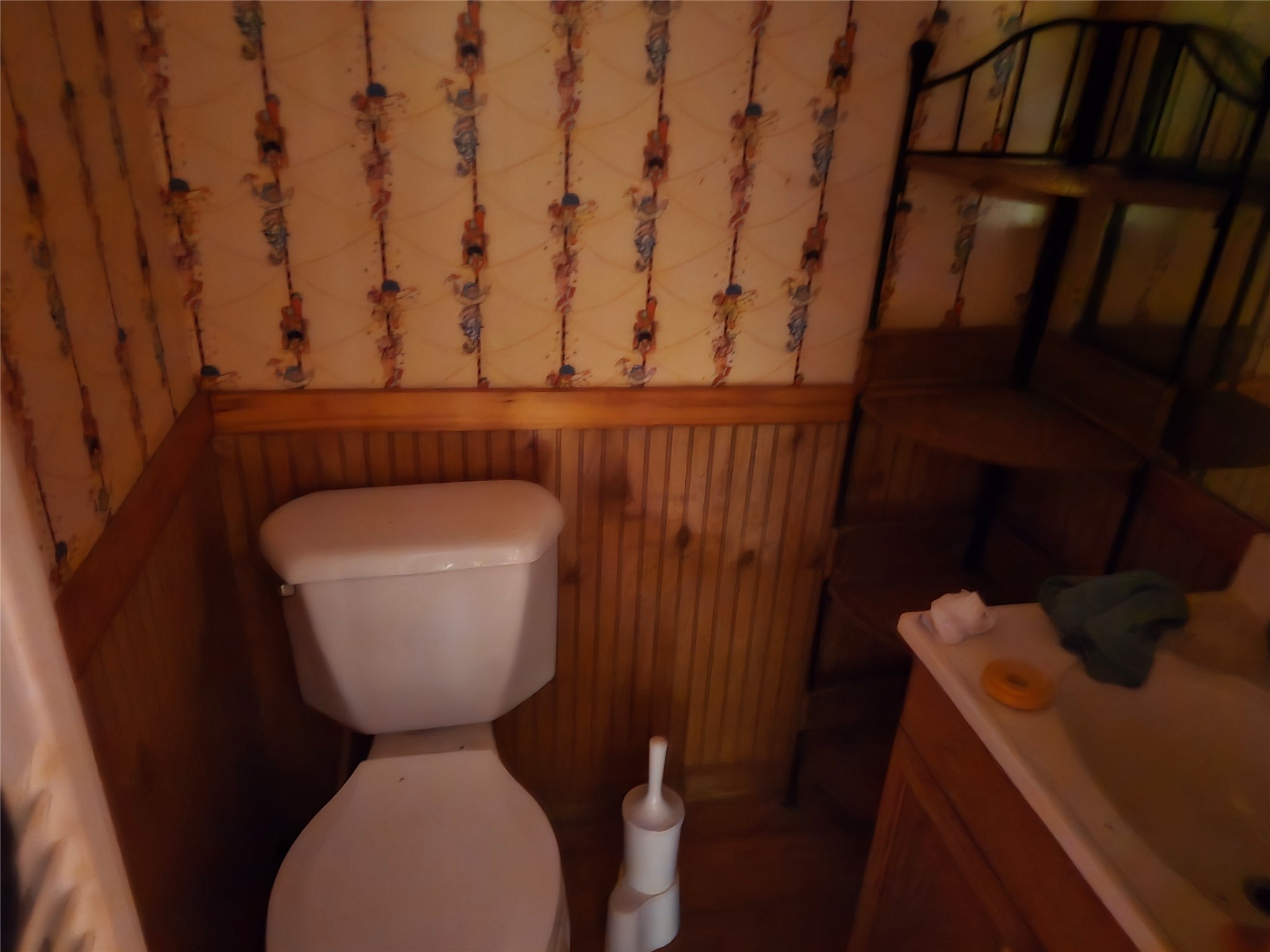 1188 Sportsman Drive Trinity, TX 75862 - Photo 17 of 26 a bathroom with a toilet and a sink