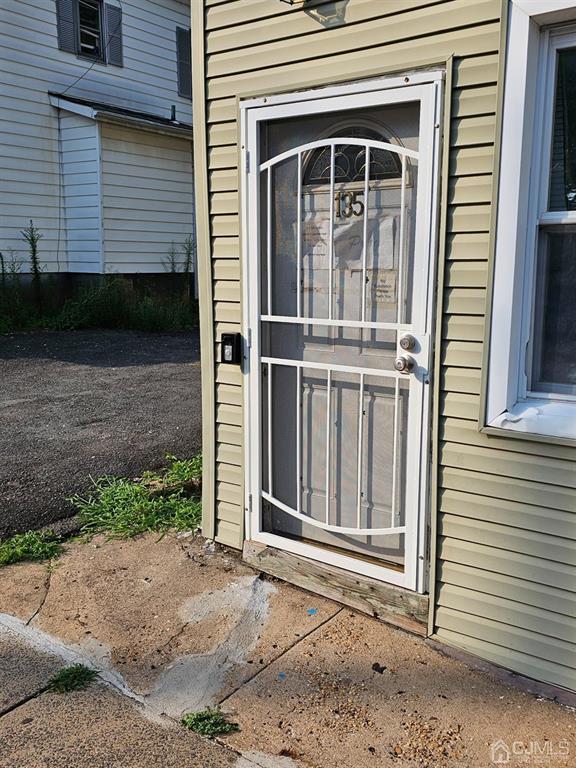 135 Baldwin Street New Brunswick, NJ 08901 - Photo 2 of 8 a view of wooden house