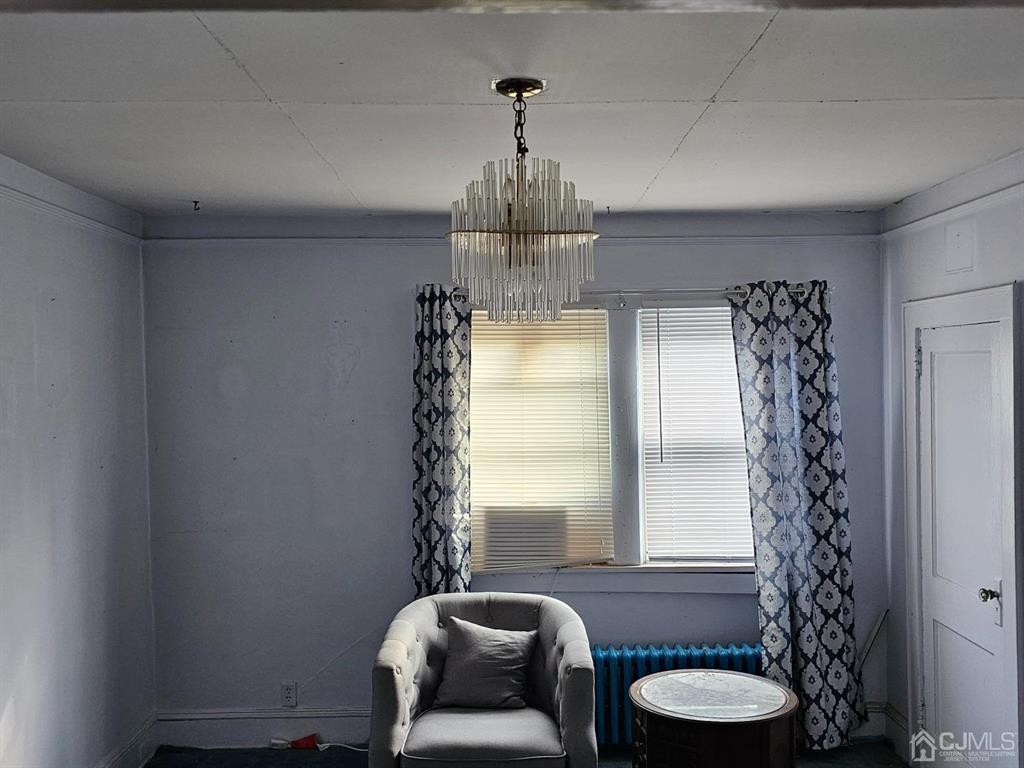 135 Baldwin Street New Brunswick, NJ 08901 - Photo 5 of 8 a bathroom with a sink a toilet and shower