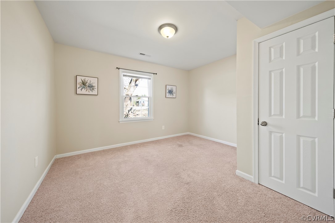 505 Bermuda Hundred Road Chester, VA 23836 - Photo 21 of 45 an empty room with windows