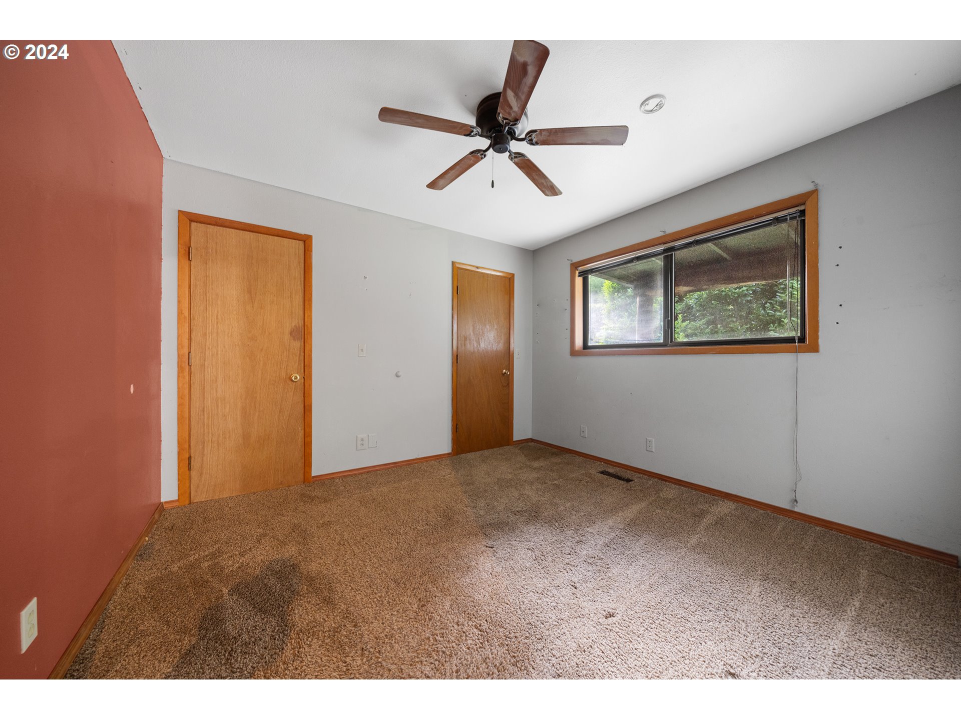 15555 Trask River Road Tillamook, OR 97141 - Photo 17 of 30 a view of an empty room with ceiling fan