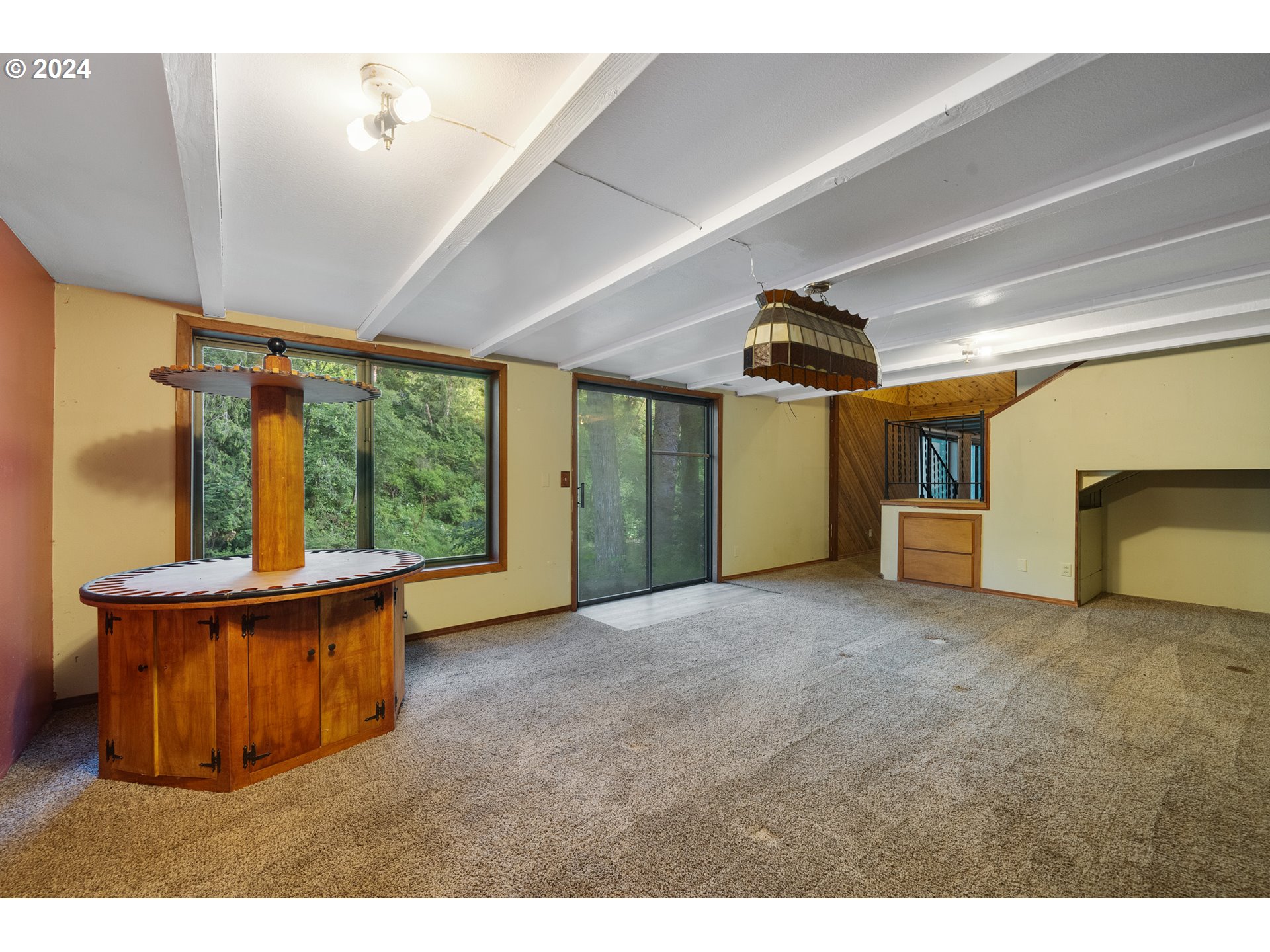 15555 Trask River Road Tillamook, OR 97141 - Photo 20 of 30 a view of a living room and a garage