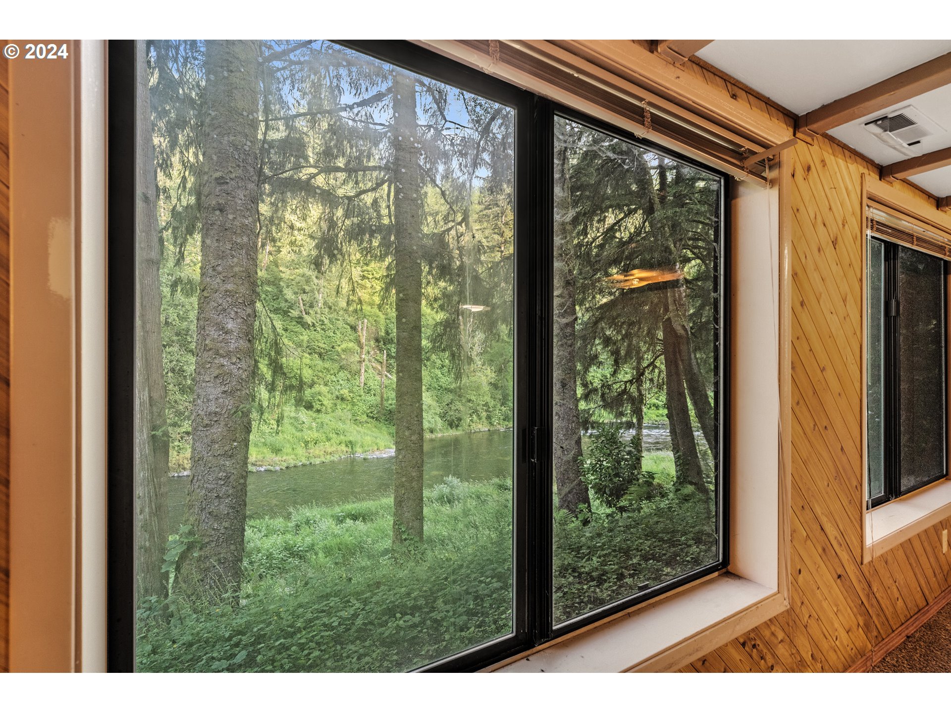 15555 Trask River Road Tillamook, OR 97141 - Photo 23 of 30 a view of a back yard from a window