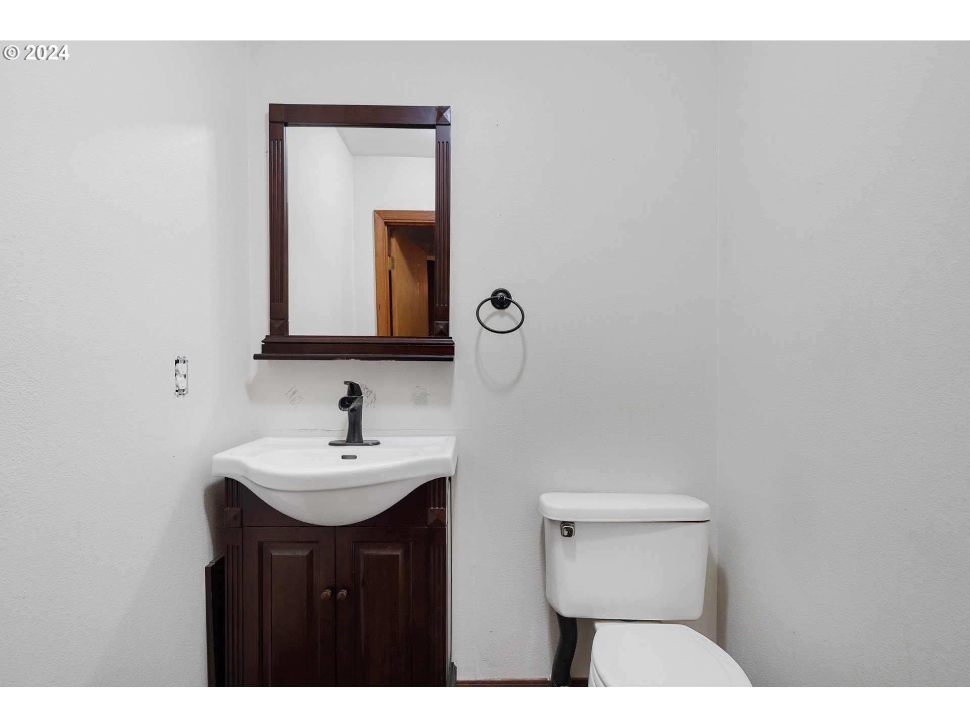 15555 Trask River Road Tillamook, OR 97141 - Photo 25 of 30 a bathroom with a sink and a mirror