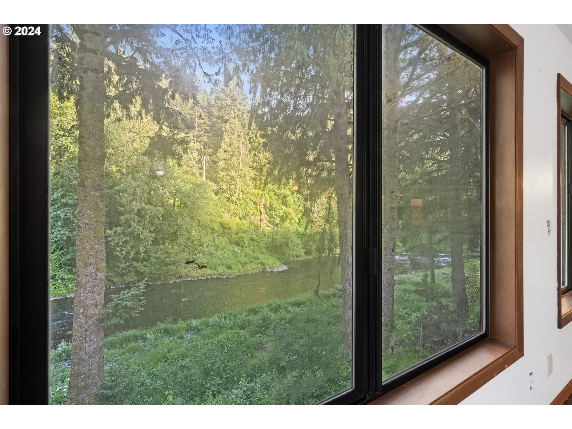15555 Trask River Road Tillamook, OR 97141 - Photo 10 of 30 a view of a glass door and porch