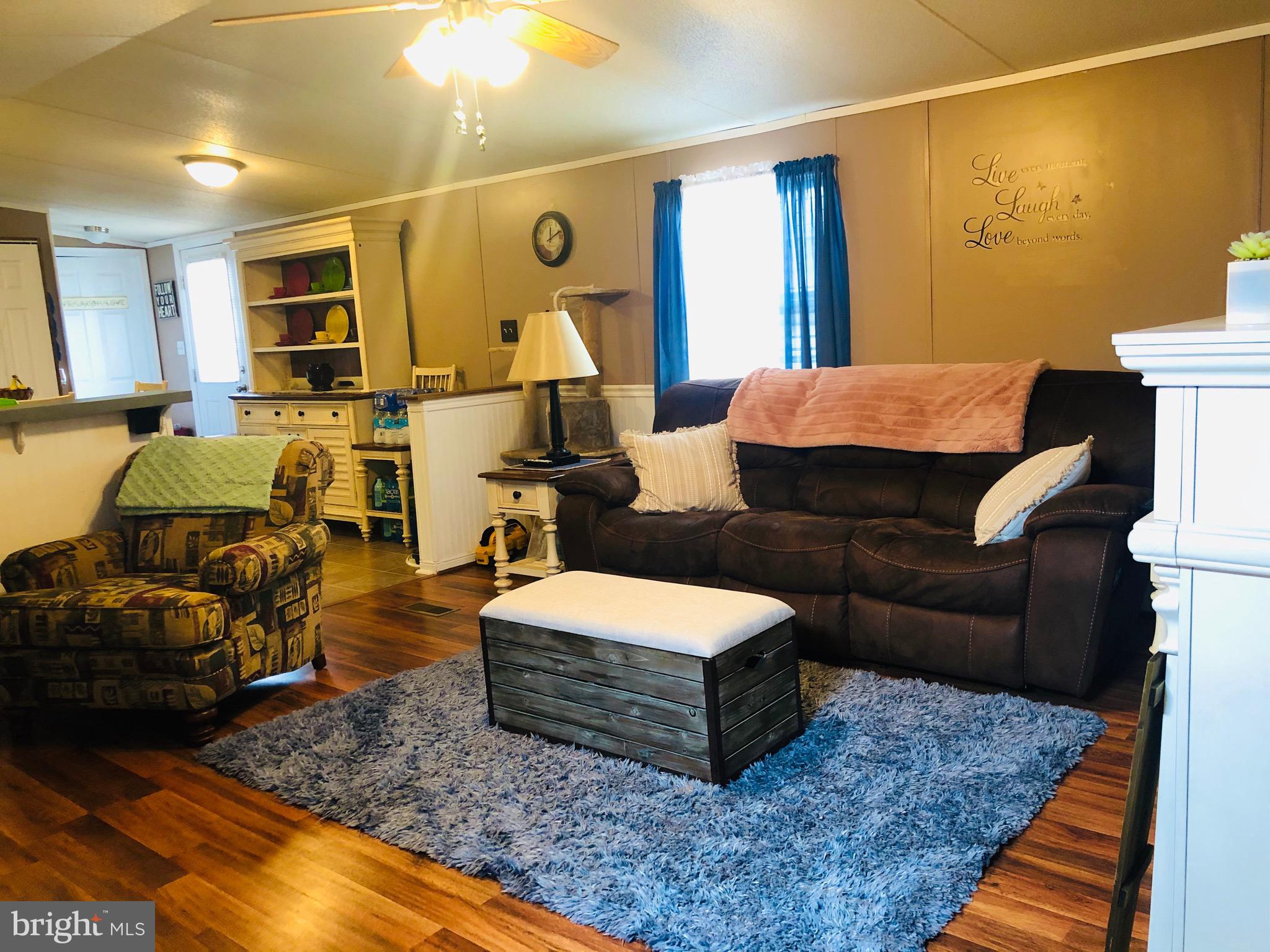 7810 Clark Road, Unit A17 Jessup, MD 20794 - Photo 4 of 32 Newer laminate flooring in family room