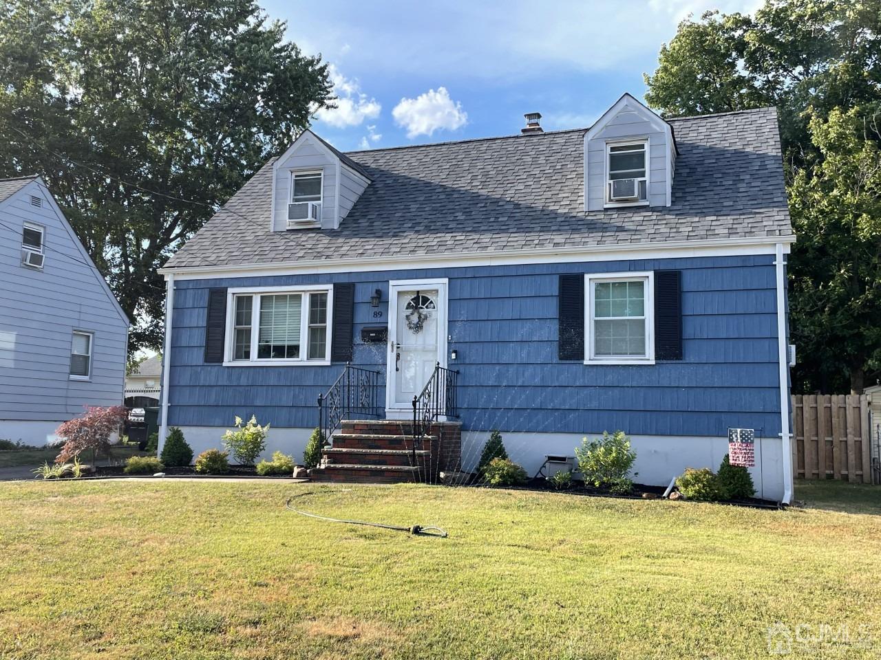 89 Leo Street Edison, NJ 08817 - Photo 1 of 31 a front view of a house with a yard