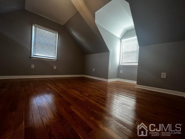 89 Leo Street Edison, NJ 08817 - Photo 17 of 31 a view of an empty room with wooden floor and a window