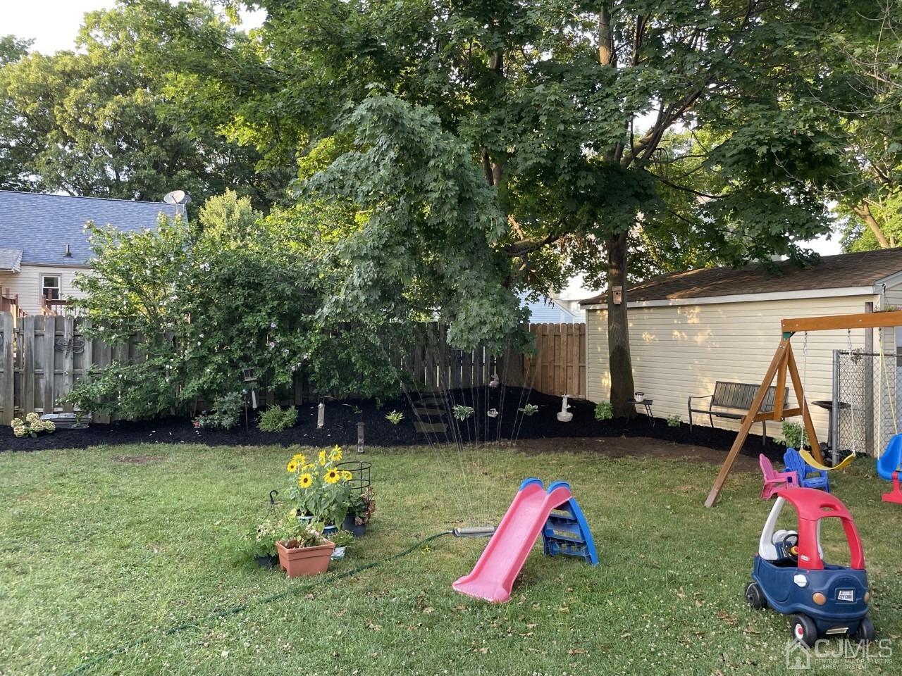 89 Leo Street Edison, NJ 08817 - Photo 24 of 31 a backyard of a house with seating space