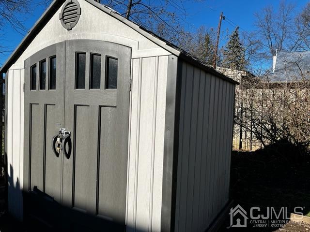 89 Leo Street Edison, NJ 08817 - Photo 27 of 31 a front view of a house with a garage