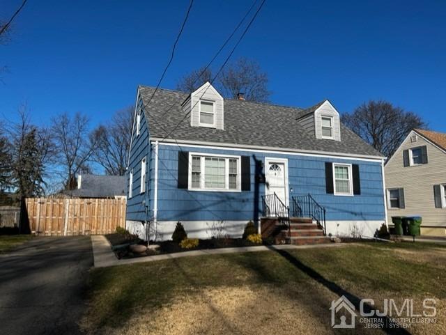 89 Leo Street Edison, NJ 08817 - Photo 3 of 31 a front view of a house with garden