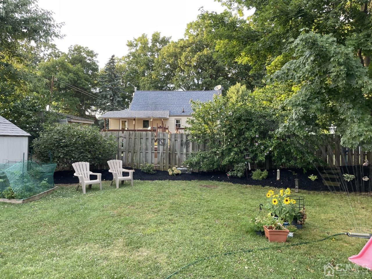 89 Leo Street Edison, NJ 08817 - Photo 31 of 31 a view of a chair and table of the garden